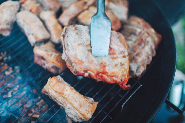 Grilled steaks with vegetables. As a whole background.