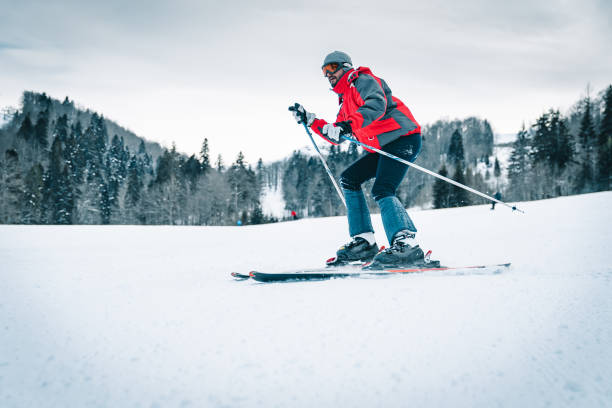 istock Skier skiing downhill in high mountains 1540872162