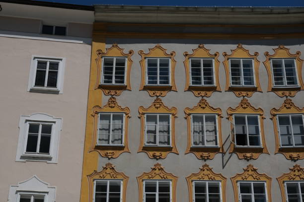 istock facade of an building with golden windows 1540873771