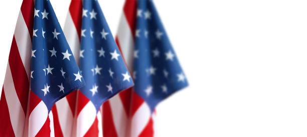 istock American flags in front of white background 1540935388