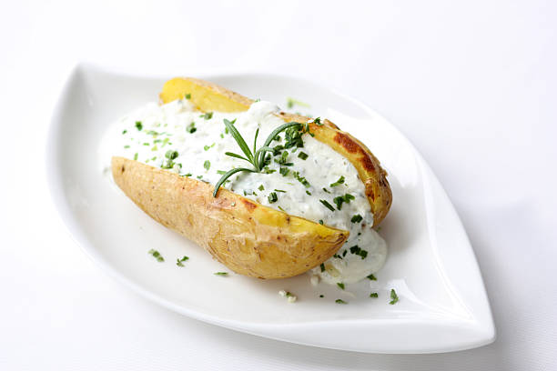 Baked Potato with Sour Cream stock photo