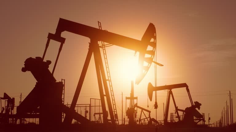 Oil Wells At Sunrise in California