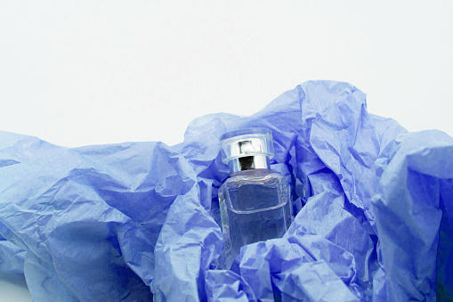 Essence wrapped in blue  paper