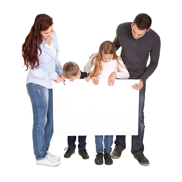 istock Cheerful young preseting a banner board 154103805