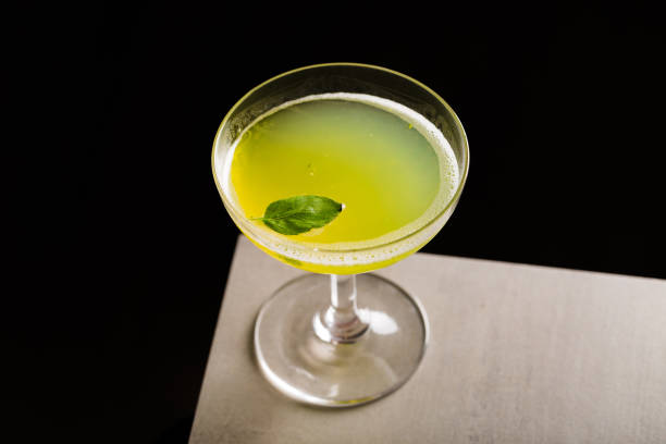 istock Gin Basil Smash Cocktail boozy gin, fresh lemon juice, basil leaves and syrup 1541045965