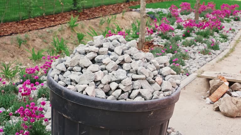 Large Bucket of Crushed Pebble Rock Aggregate used for Garden Design and Road Paving