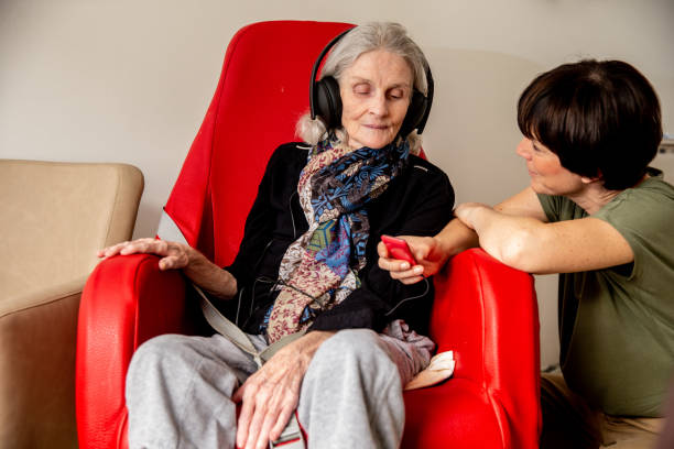 istock Senior woman relaxing with music 1541079728