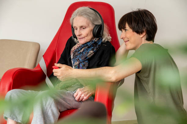 istock Senior woman relaxing with music 1541079735