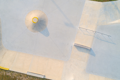 Aerial view of a public playground for a skateboard in a recreation park.