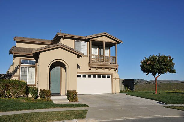 istock Two story single family house with driveway 154113630