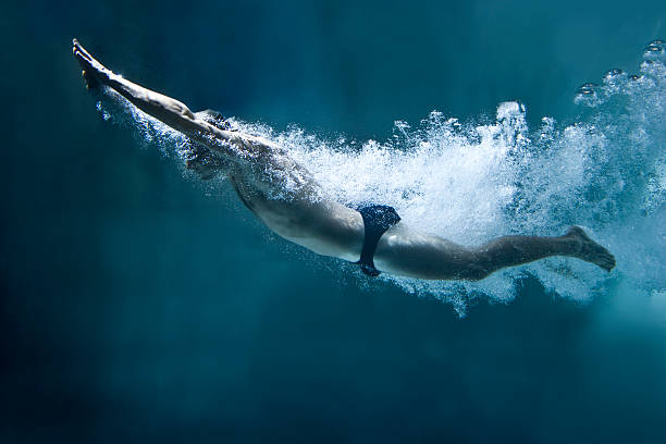 istock Male swimmer underwater in speedo 154116427