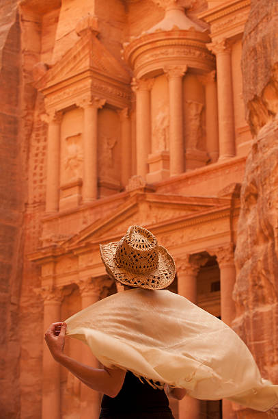 istock Woman traveller at ruin. Petra 154119019