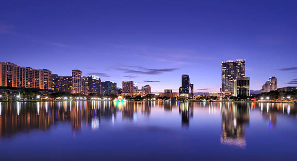 Orlando Skyline Skyline of Orlando, Florida from lake Eola. lake eola stock pictures, royalty-free photos & images