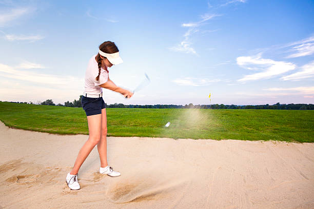 istock Girl golf player chipping ball in bunker. 154125851