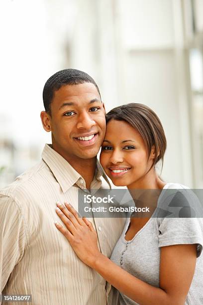 Romantic Young Couple Smiling Stock Photo - Download Image Now - 20-24 Years, 20-29 Years, Adult