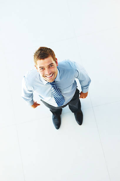 istock Businessman looking upward and smiling 154126126