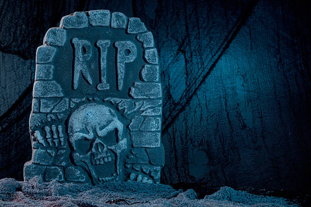 istock Tombstone with skull halloween 154127098