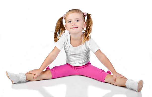 istock Gymnast cute little girl isolated 154127436
