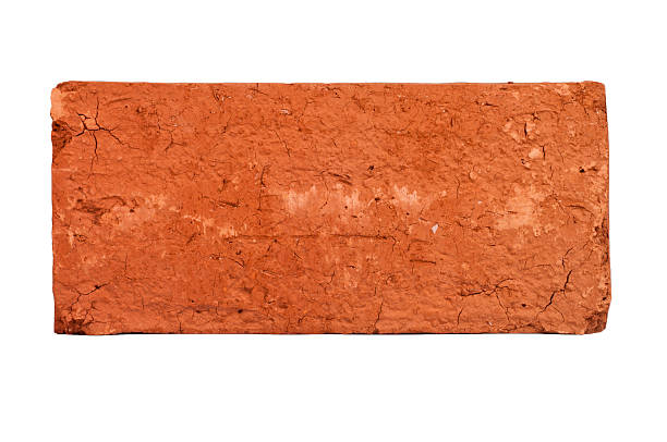 original Brick Straight on closeup shot of a solitary red brick used in construction and home building. single object stock pictures, royalty-free photos & images
