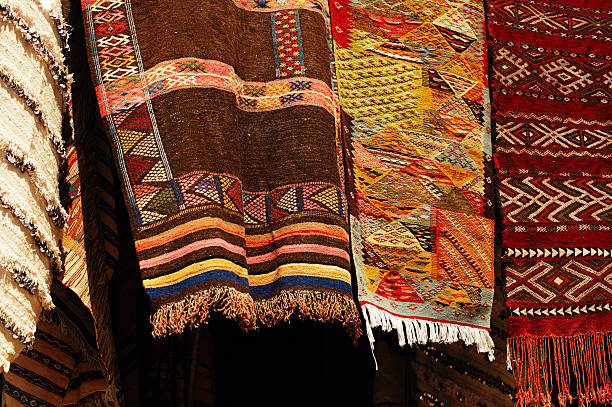 istock Moroccan Carpets in a street shop souk 154140535