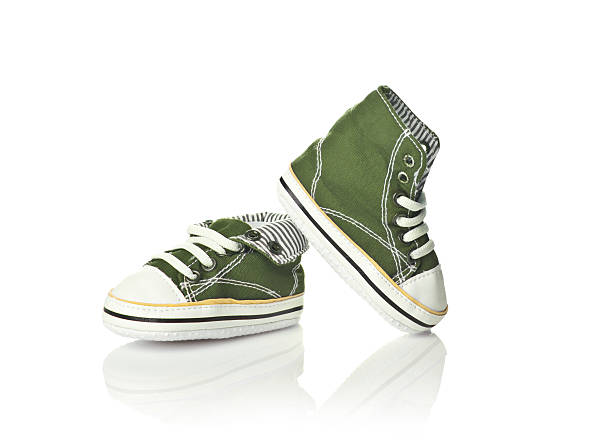 istock Green baby shoes 154154396