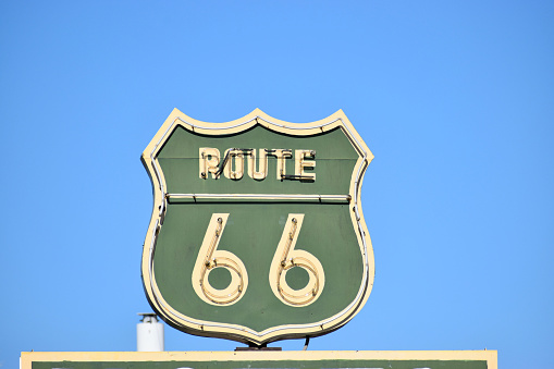 Sign route 66 on green background