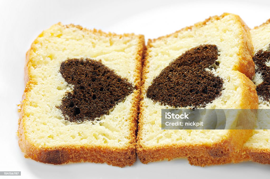 lovely cake closeup view of two slices of cake with cocoa heart inside Abstract Stock Photo