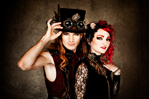 Studio shot of a young couple styled in 80s clothing