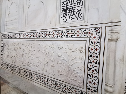 Patterns on the wall of the Taj Mahal in Agra, India. Taj Mahal is a UNESCO World Heritage Site.