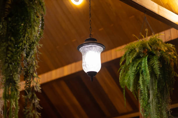 istock Vintage white pendant lamps provide light at night. 1541644876