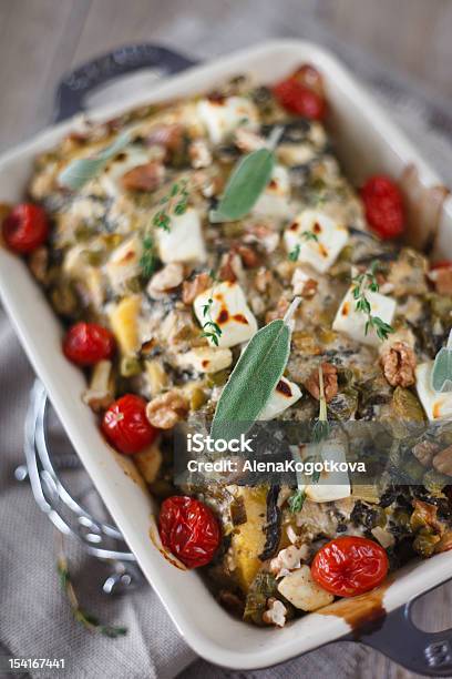 Baked Polenta With Vegetables Stock Photo - Download Image Now - Baked, Butter, Ceramics