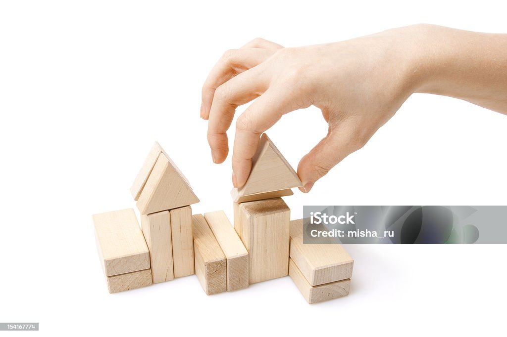 Wooden toy blocks on white background Architecture Stock Photo