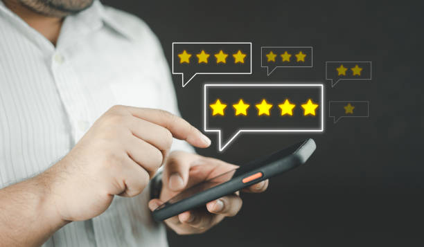 istock Client man choosing 5-star icon to give satisfaction in service for evaluation product service quality. 1541680138