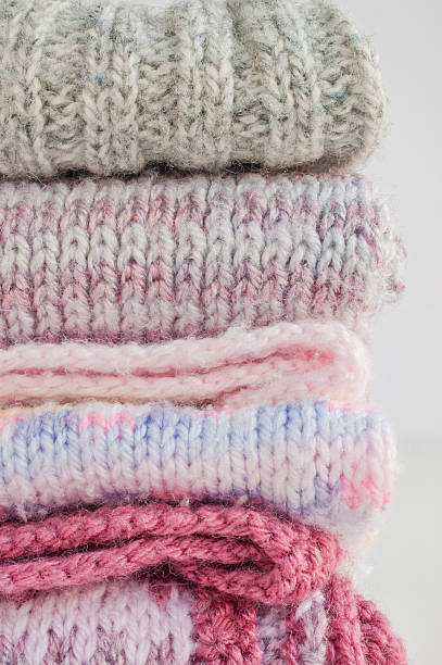 istock Knitted warm woollen jumpers and vests. 154168850