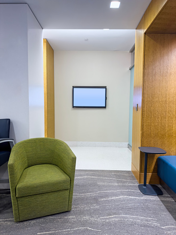 Waiting room with chic modern furniture at doctor's office