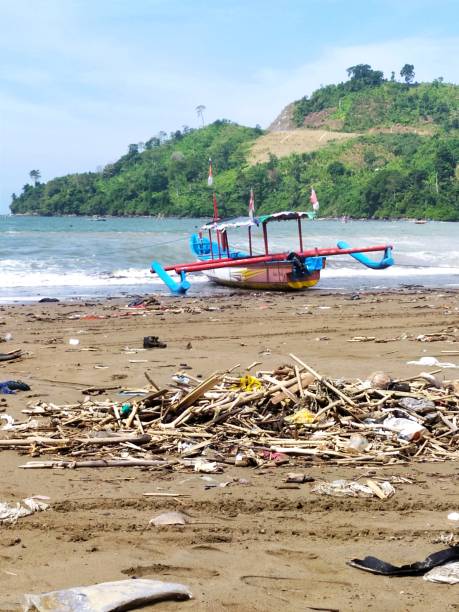istock Fishing Boat on a Beach 1541691583