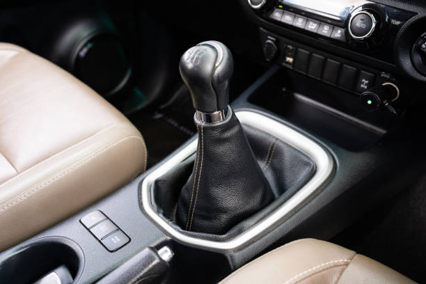 istock automatic transmission shift selector in the car interior. Closeup a manual shift of modern car gear shifter. 4x4 gear shift 1541742817