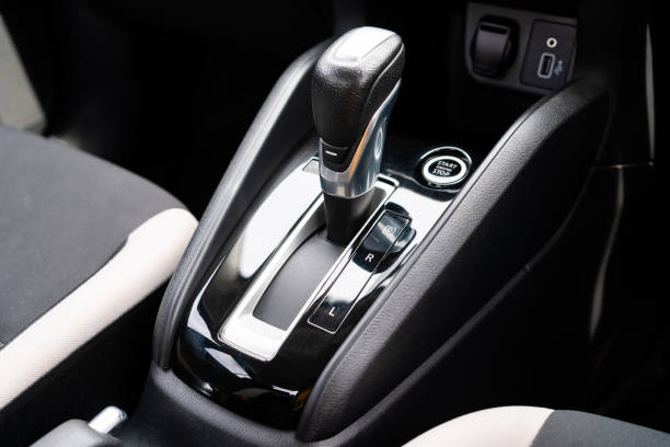 istock automatic transmission shift selector in the car interior. Closeup a manual shift of modern car gear shifter. 4x4 gear shift 1541743377