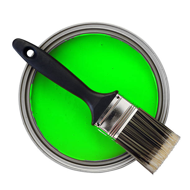 istock green paint can with paintbrush 154180278