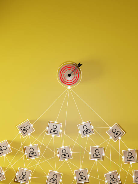 istock Red dartboard and black arrow connection linkage with human icon for customer focus target group and customer relation management concept. 1541841171