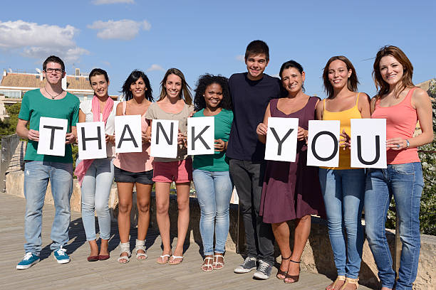 Group of people saying Thank You
