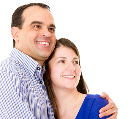 Happy young couple on white background with copy space