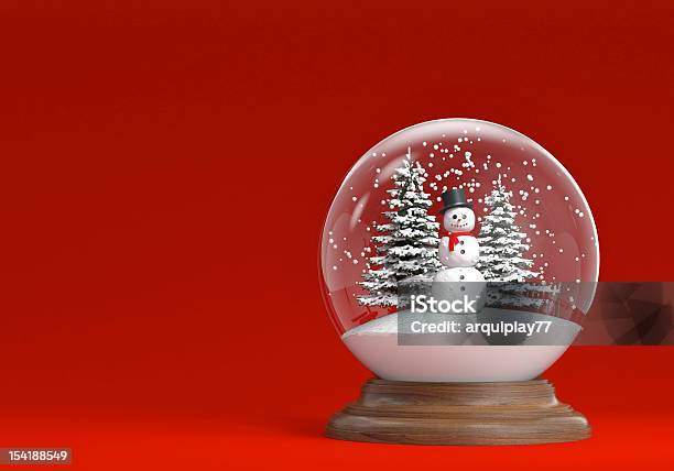 Snowglobe With Snowman And Trees On Red Stock Photo - Download Image Now - Snow Globe, Christmas, Christmas Tree