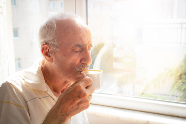 istock The man is drinking coffee looking out the window 1541906264