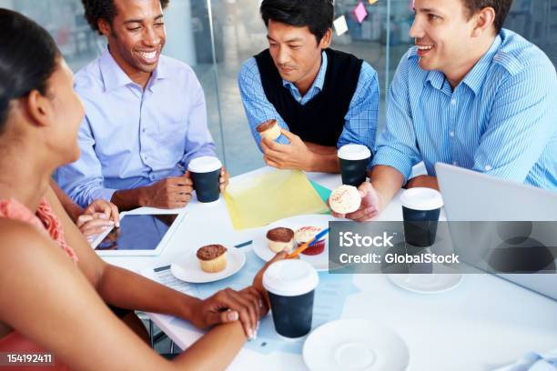 Refuelling For Another Brainstorming Session Stock Photo - Download Image Now - Cupcake, Office, Adult