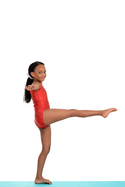 istock Young girl doing gymnastics balance move 154194770