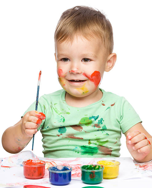 istock Little boy is playing with paints 154196707