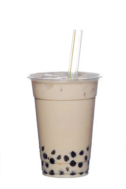 Photo of Light brown, pearl, milk tea with a straw
