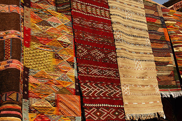 istock Moroccan Carpets in a street shop souk 154202438