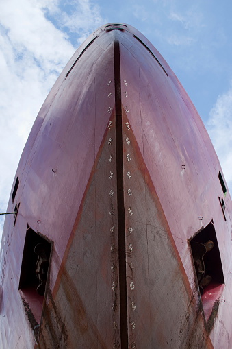 Close-up view ice class type ship's bow at the shipyard.